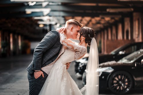 Portrait of Bride and Groom Kissing