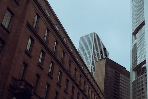 Photo of an Apartment Building Near High-Rises