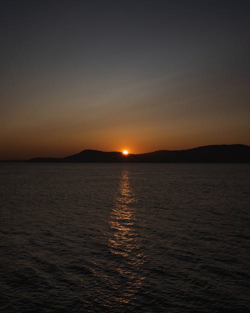 Photos gratuites de coucher de soleil, îles san juan, pnw