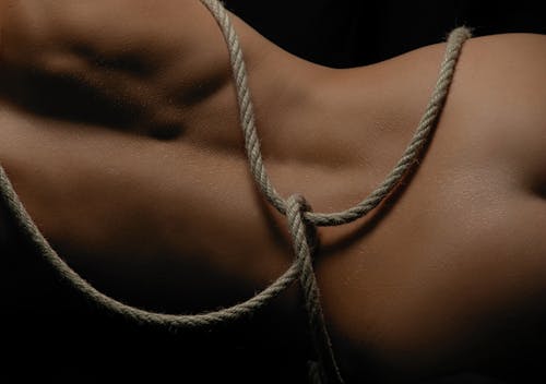 A Nude Person with Rope Tied around its Body