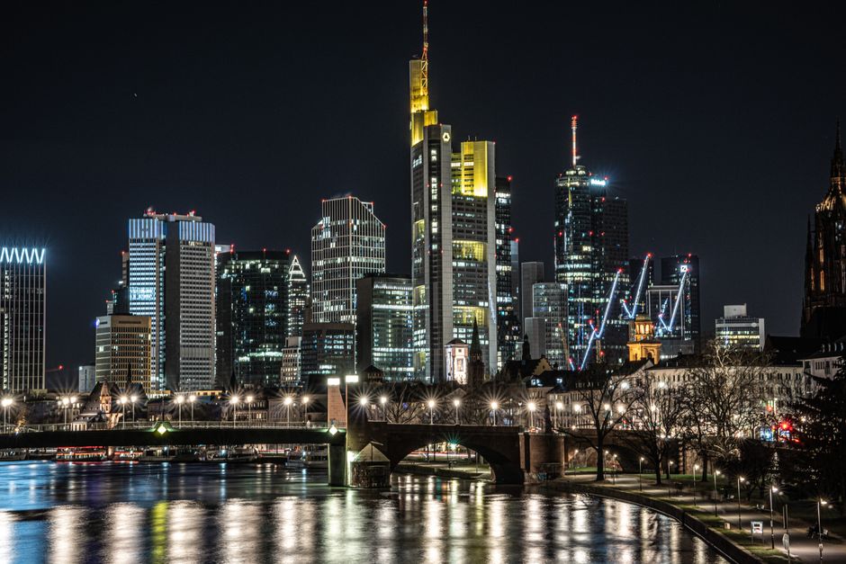 Illuminated city skyline of a major German city