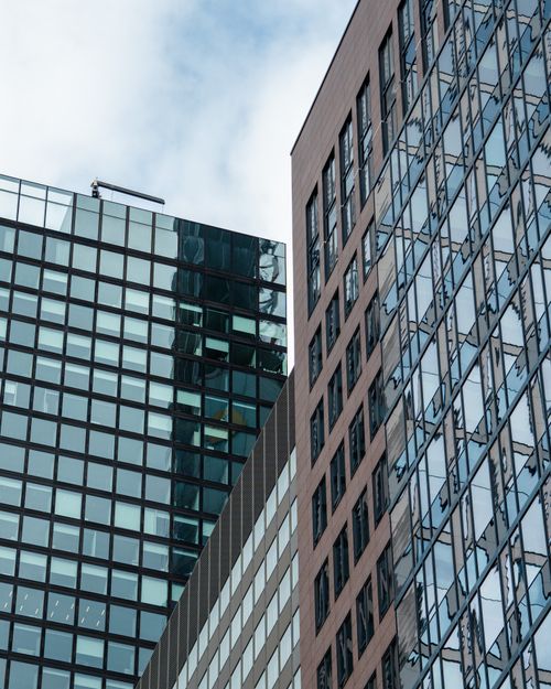 Free Glass facade skyscrapers showcasing modern architecture in Frankfurt, Germany. Stock Photo