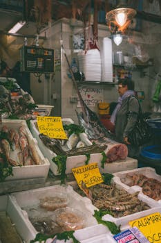 A vibrant market scene showcasing fresh seafood and local specialties in Italy.