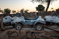 Blue and White Atv on Brown Wooden Table