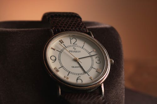 Close-up Photo of a Peugeot Wristwatch