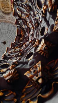 A detailed view of an ornate church ceiling showcasing intricate architectural patterns.