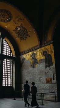 Explore a historic church interior adorned with religious icons and stunning architecture.
