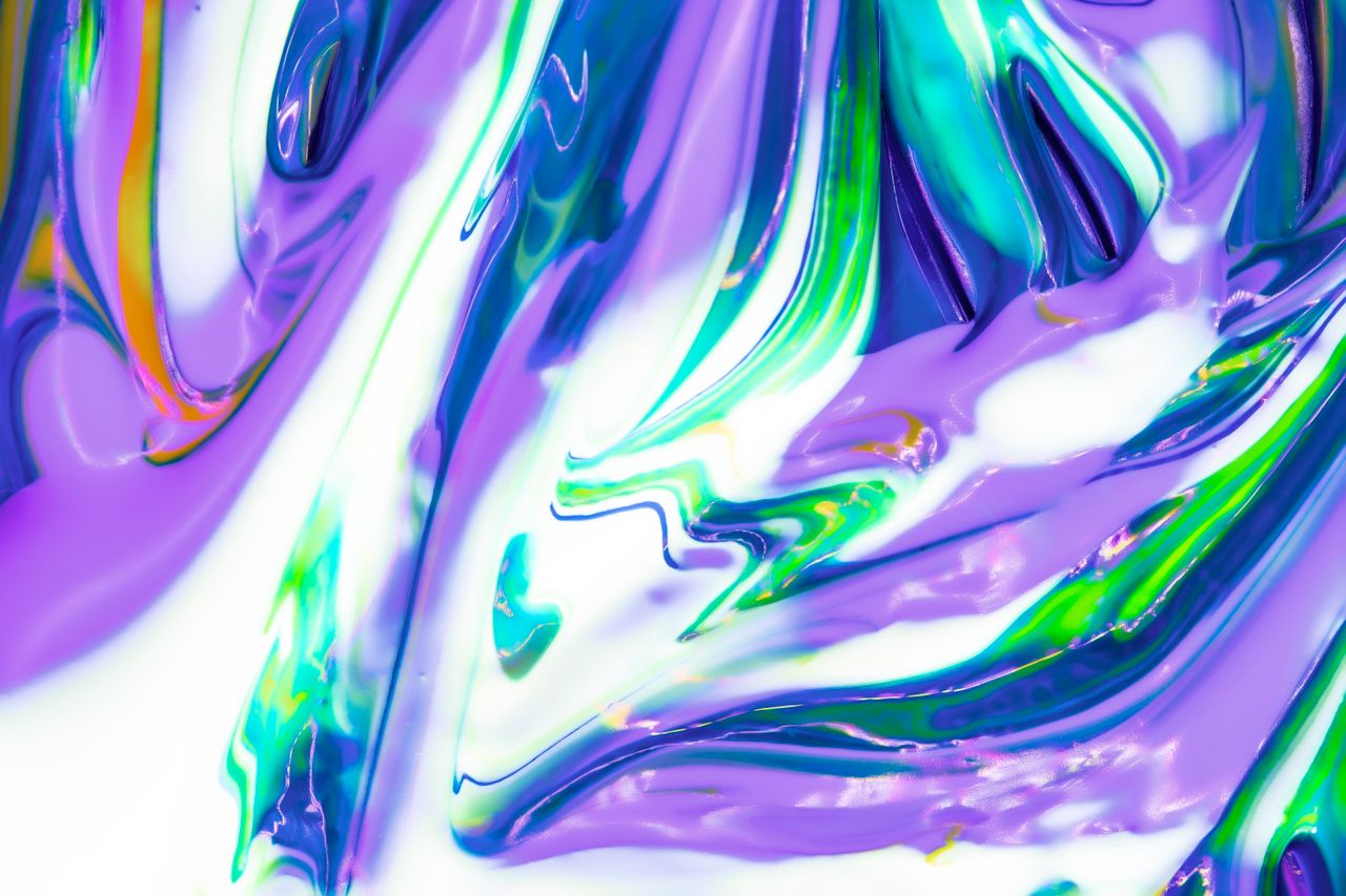 dynamic swirling patterns of vivid colors creating an abstract artisti