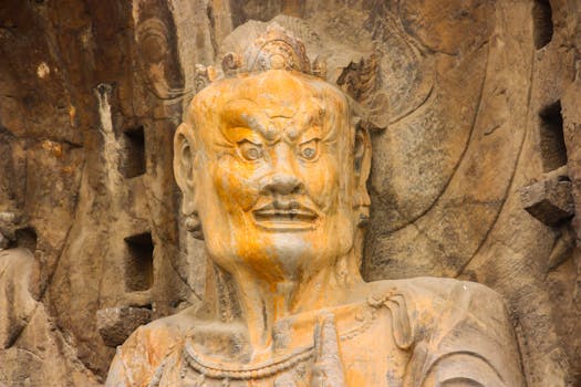 Close-up view of ancient sculpture at Longmen Grottoes, Luoyang, China, showcasing intricate craftsmanship.