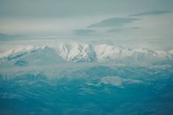 An Aerial Photography of Snow Covered Mountains