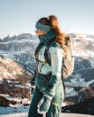 Woman Hiking in Mountains in Winter 