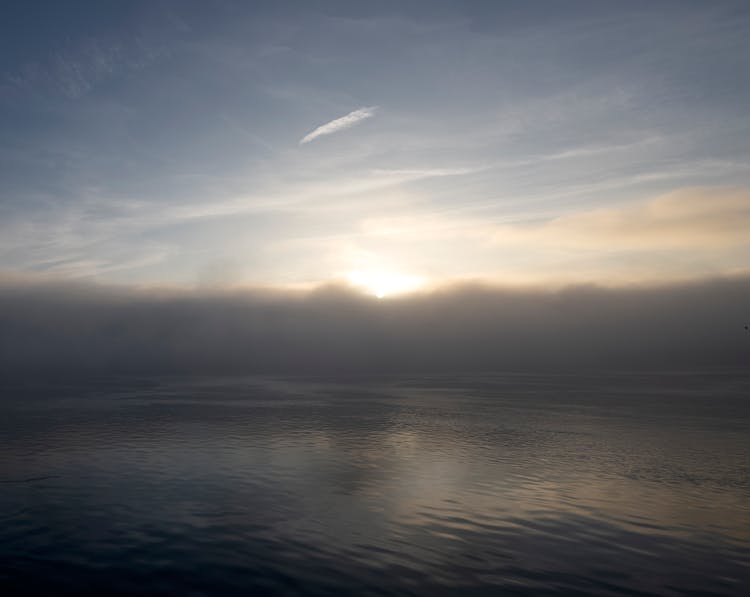 Ocean Under The Cloudy Sky