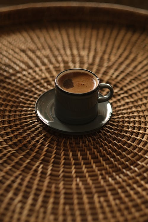 Cup of Coffee on Wicker Table