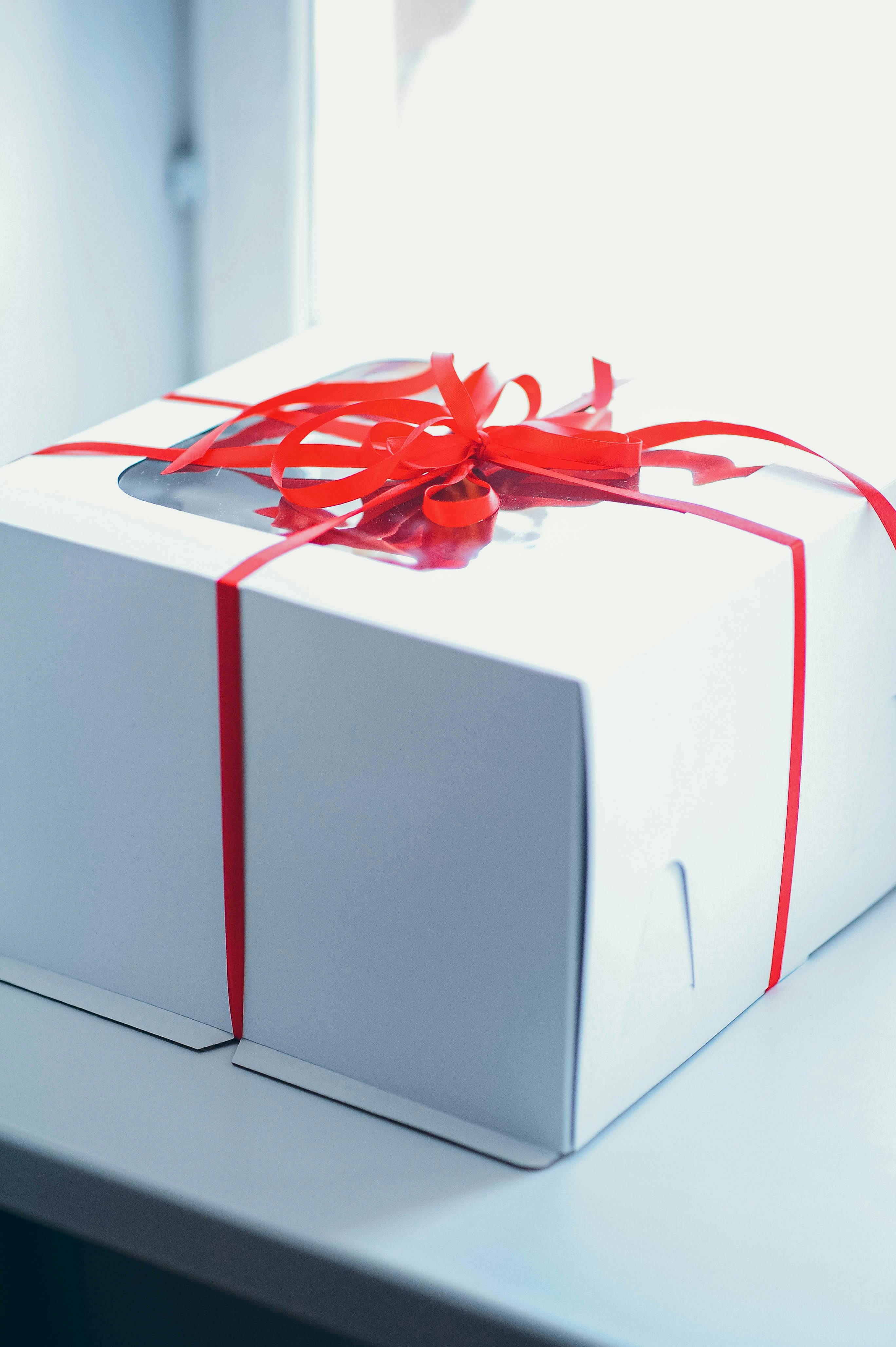 Violet Gift Boxes Stock Photos and Images - 123RF