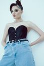 Woman in Black Tank Top and Blue Denim Bottoms