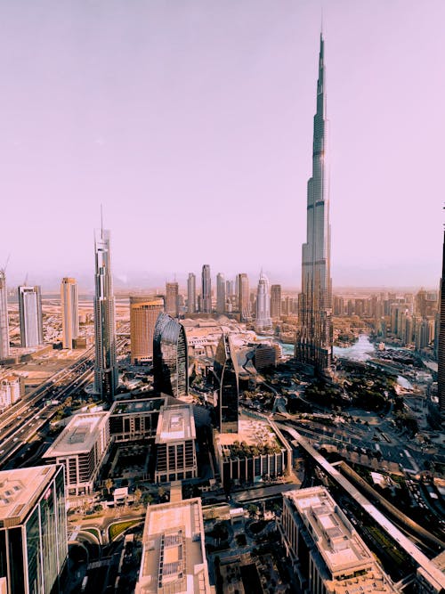 Free Photograph of the Burj Khalifa Near Buildings Stock Photo