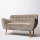 Gray Sofa Beside White Wall