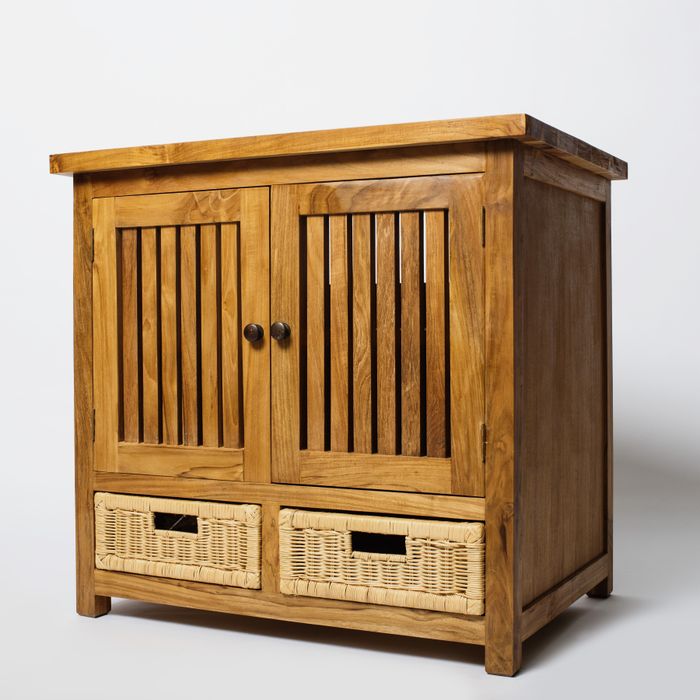 A slatted teak storage chest with woven drawer baskets. Photo by Ksenia Chernaya on Pexels
