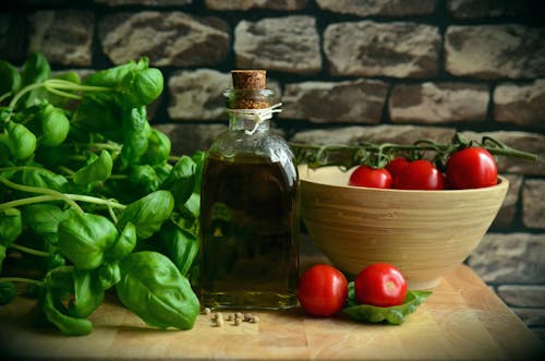 Gratis Fotos de stock gratuitas de aceite de oliva, albahaca, comida Foto de stock