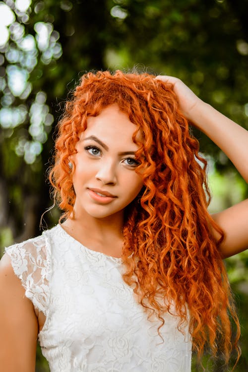 Portrait of a Woman with Red Curly Hair
