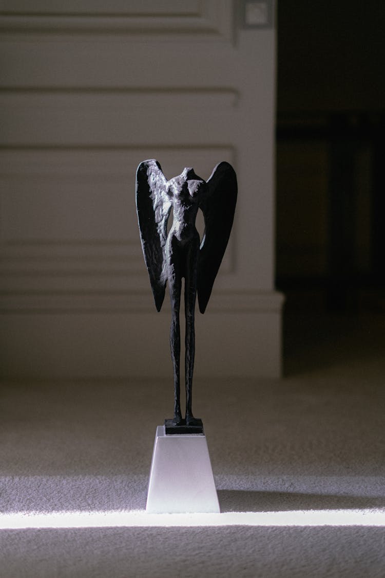 Headless Angel Statue On Display In Museum