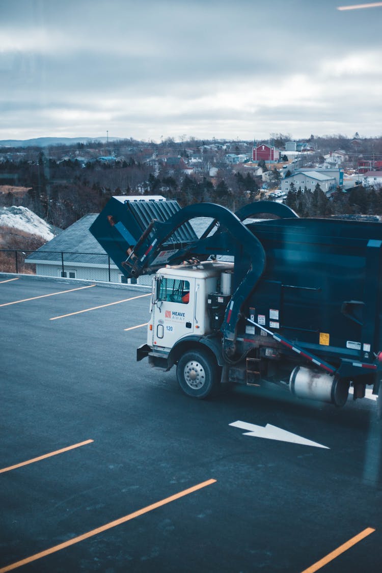 Garbage Truck Emptying Waste Bin