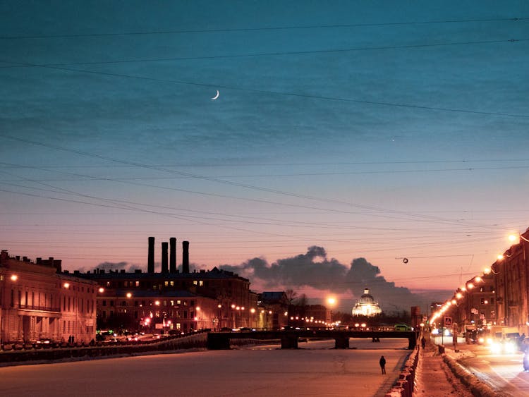 City With Frozen River At Night