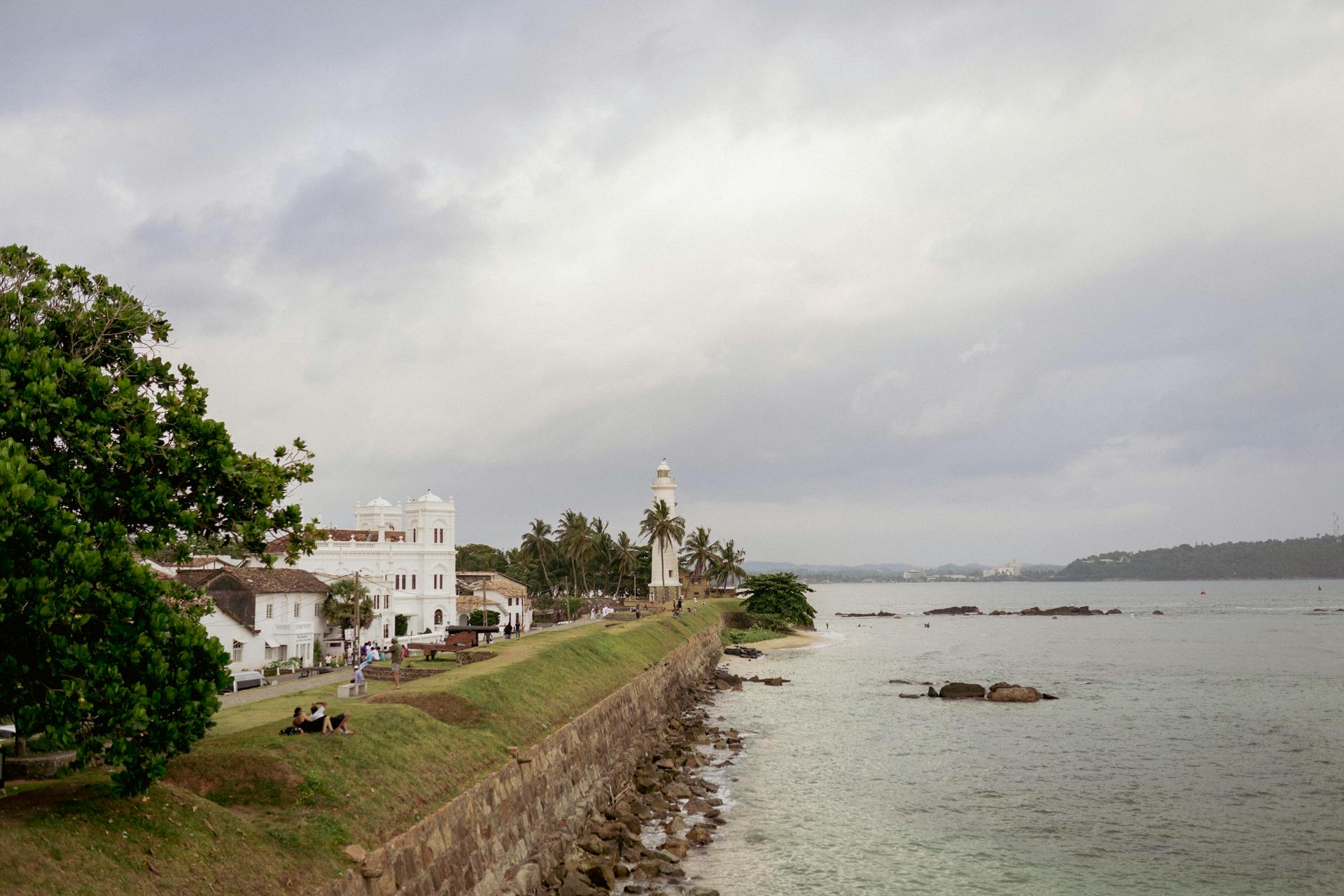 Serene view of the Galle lighthouse and Indian Ocean from the fort wall, Sri Lanka.