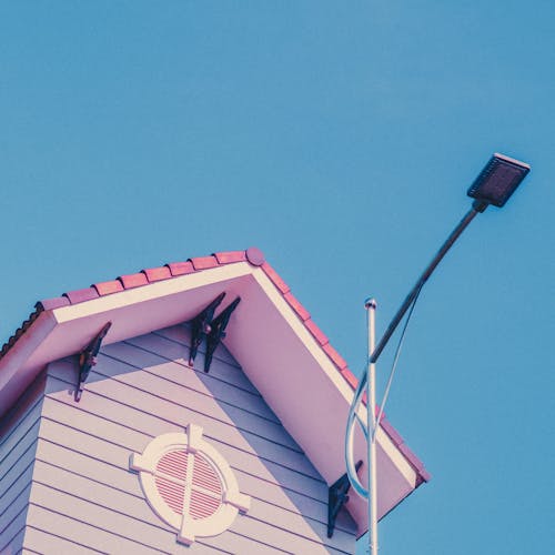 Pastel Building under Blue Sky