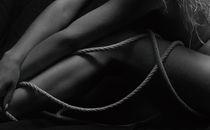 Grayscale Photo of a Persons Hand