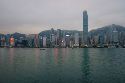 Free Stunning view of Hong Kong's skyline reflecting in the harbor during twilight. Stock Photo