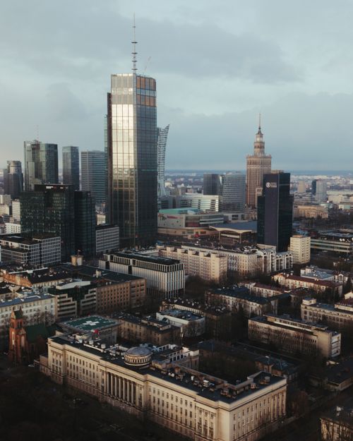 Free A stunning aerial view of Warsaw's skyline featuring towering skyscrapers and urban landscape. Stock Photo