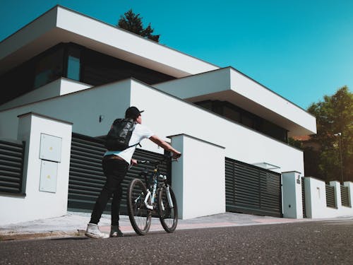 Man Holding Bike 