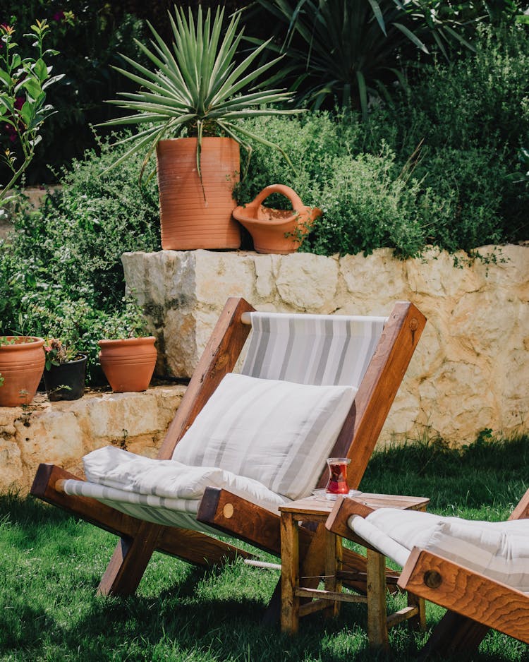 Deck Chair In Garden In Summer