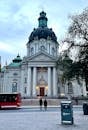 People Walking Near White and Blue Cathedral