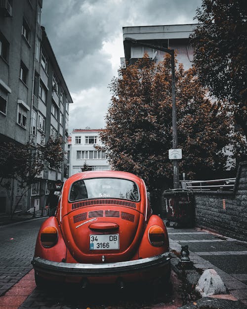 Free Red Car on the Road Stock Photo
