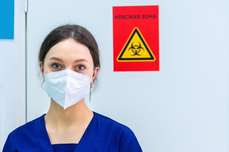 Portrait Of Nurse In Face Mask