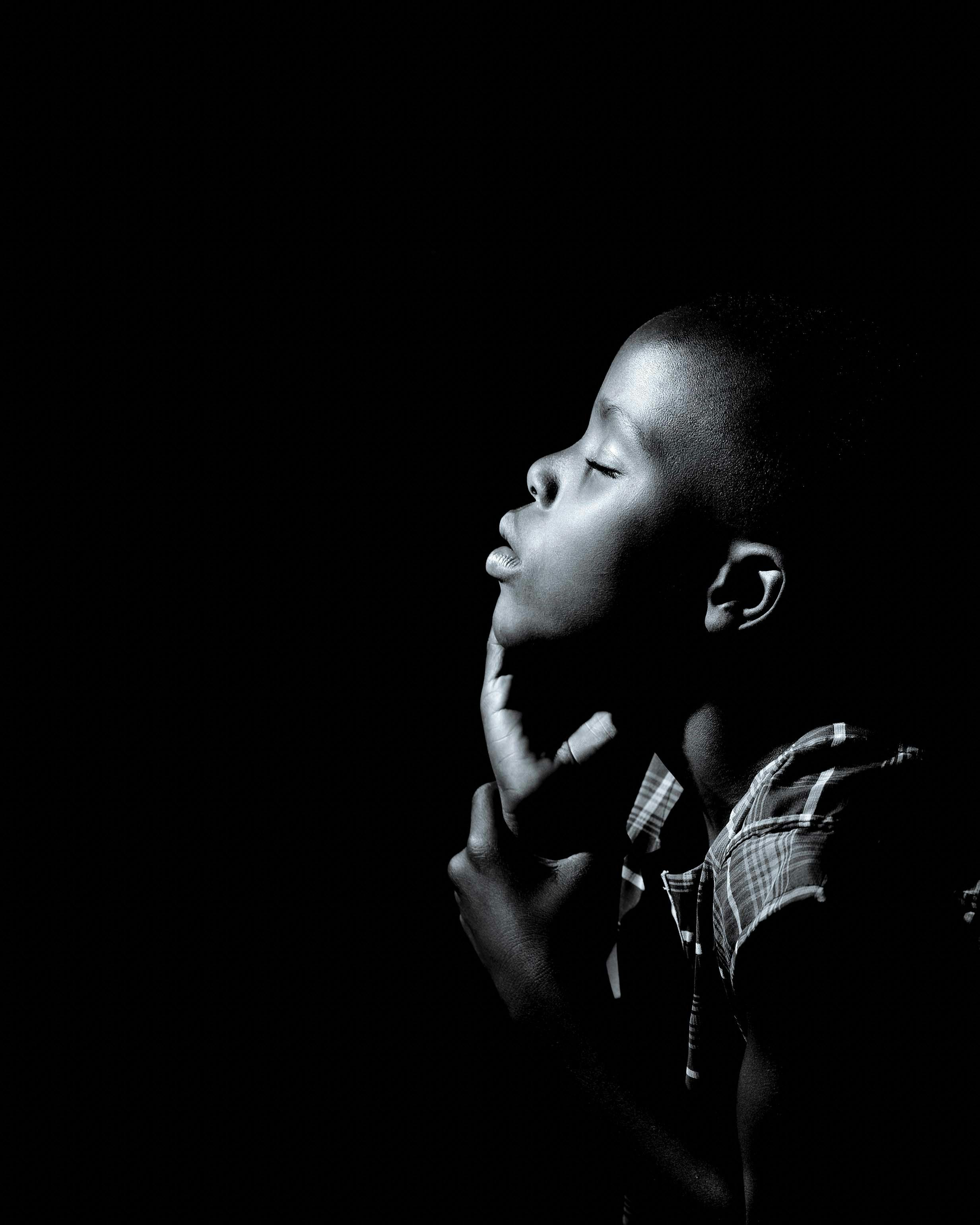 black baby praying