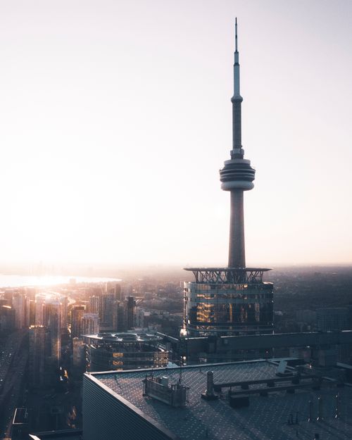 Free Stunning view of Toronto's skyline with CN Tower at sunrise. Stock Photo