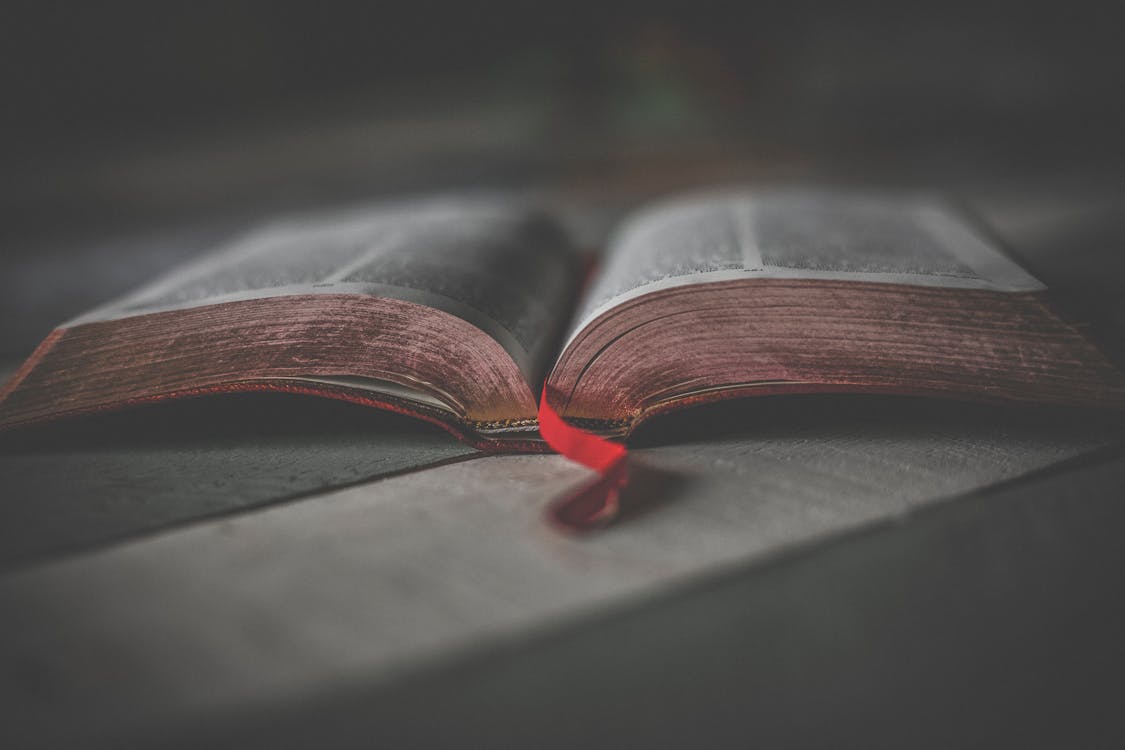 Free Close-up Photo of an Opened Religious Book  Stock Photo