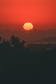 Captivating sunset with vibrant orange sky in Punta del Este, Uruguay.