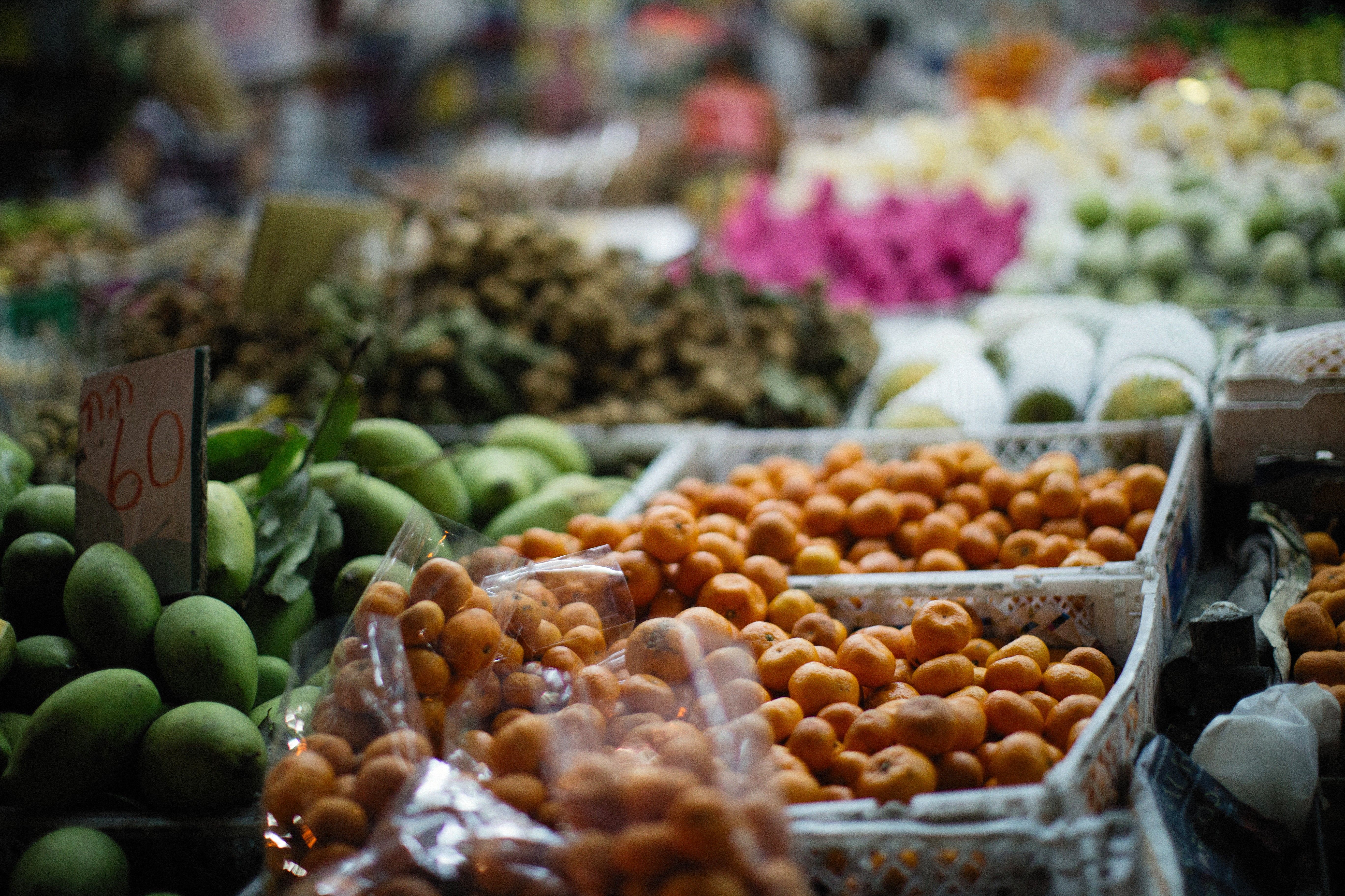 Vibrant assortment of fruits at a market stall showcasing diversity and freshness.