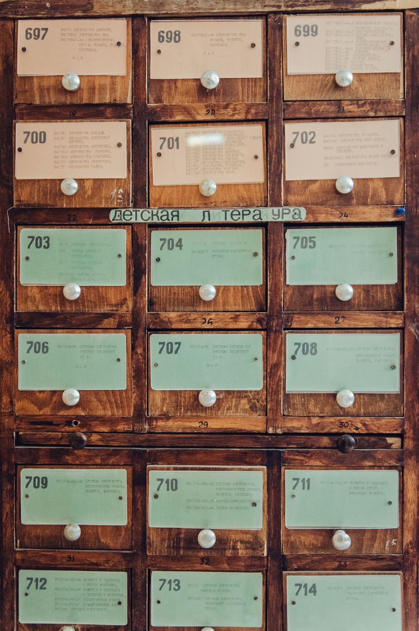filing cabinet drawers labeled with index tags