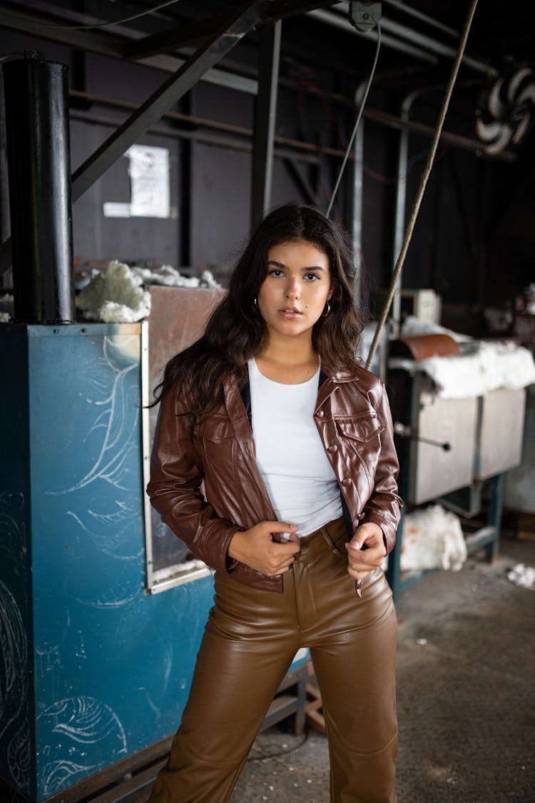 Beautiful Woman Posing In Leather Pants And Jacket