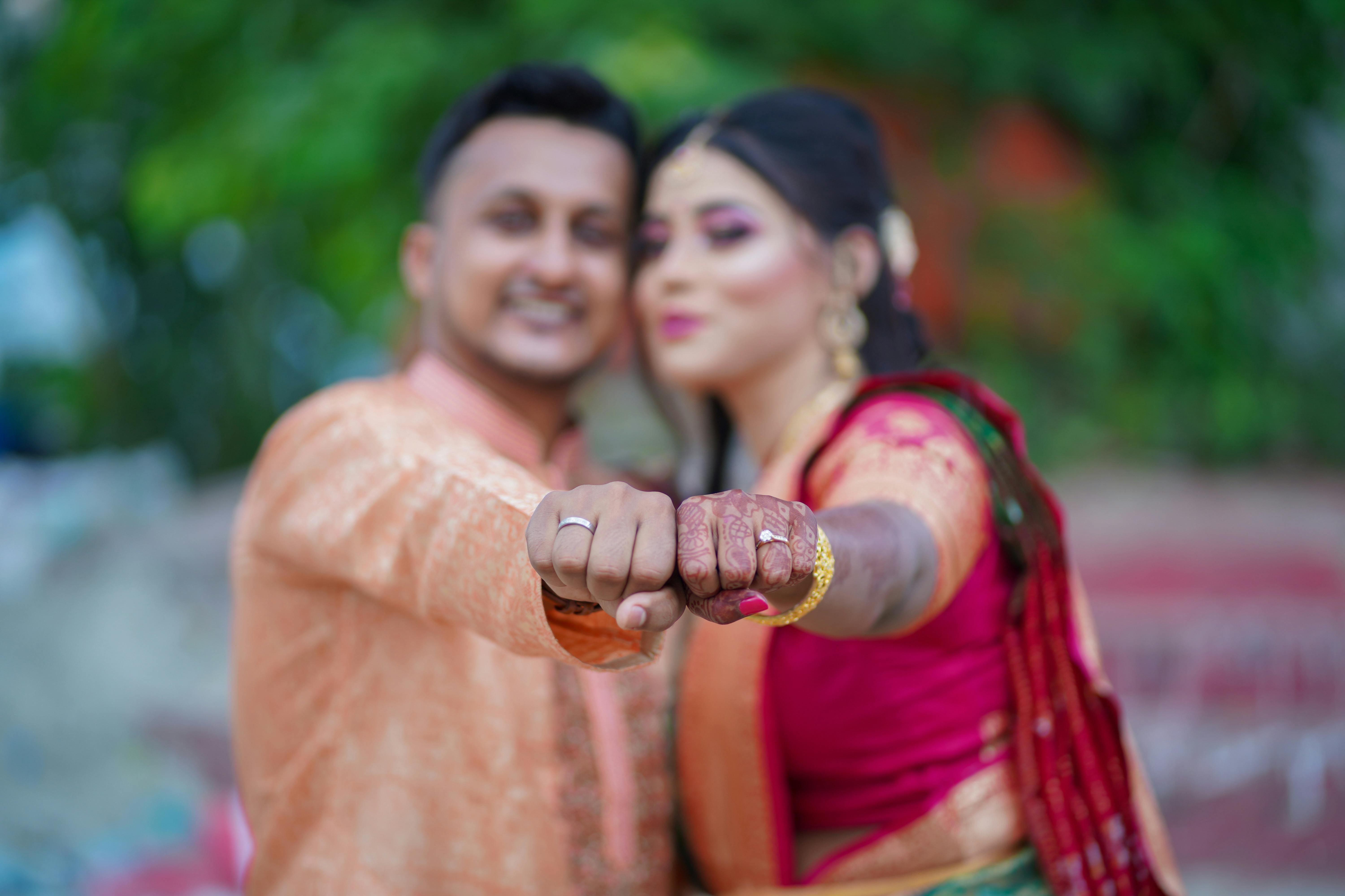 A Couple in Their Wedding Clothes · Free Stock Photo