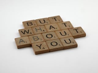 Wooden Scrabble Tile with a Message