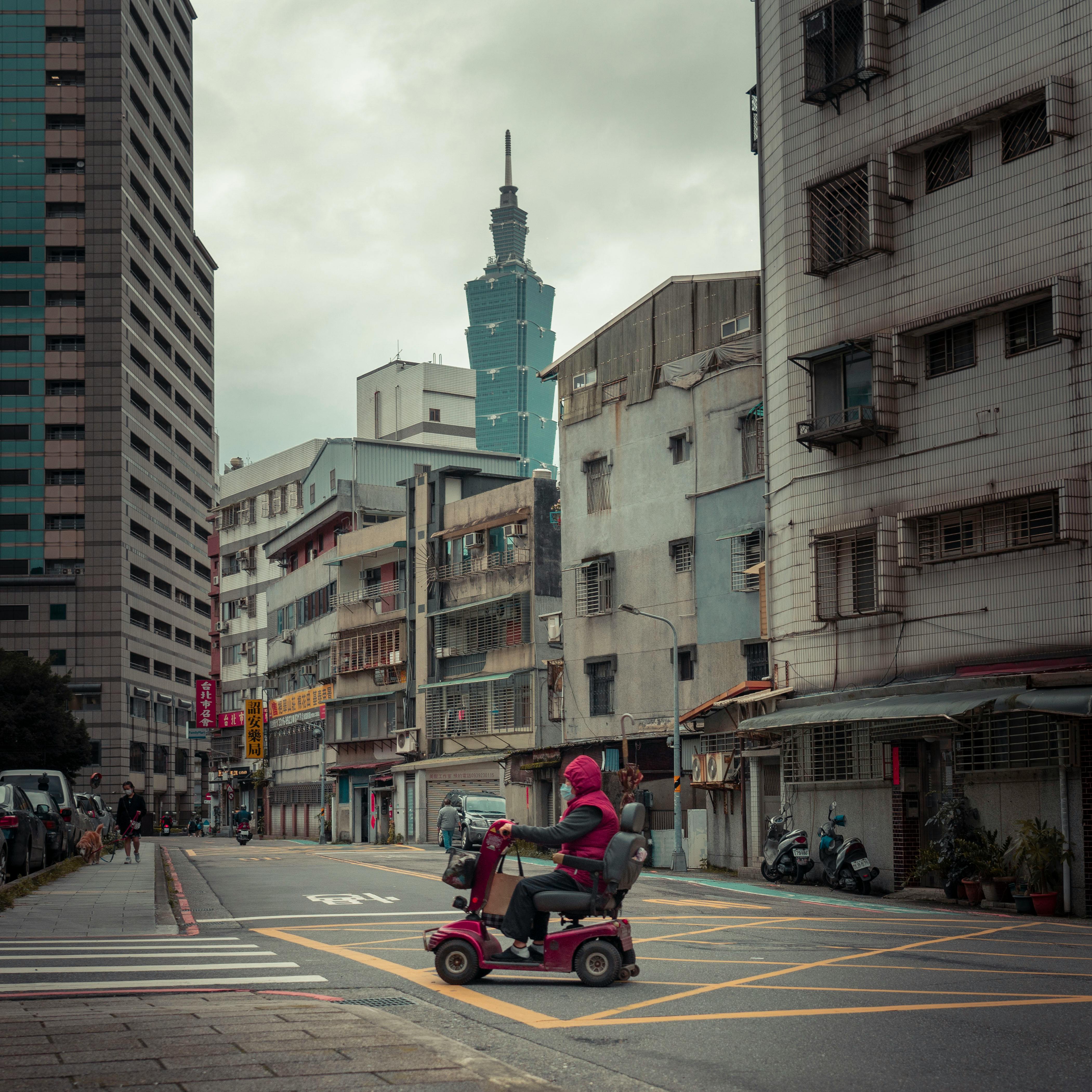 Person on Scooter on Street