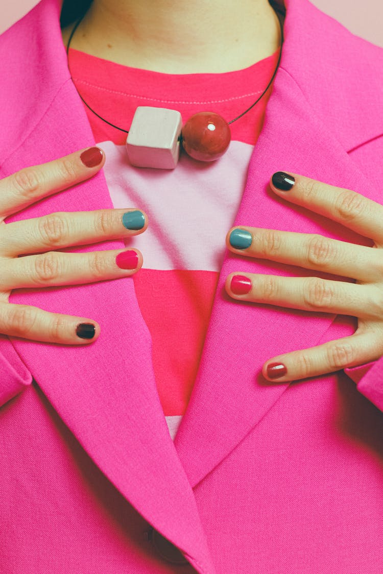 A Person With Colorful Nail Polish