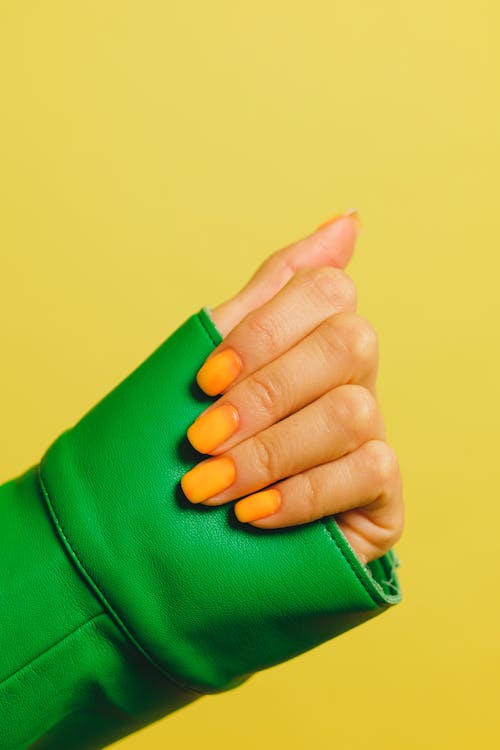 Close Up Photo of Manicured Nails