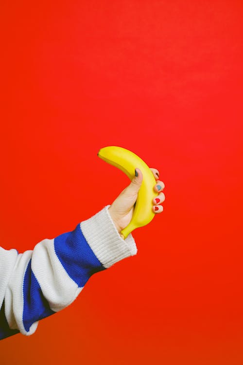 Close-up of Holding a Banana